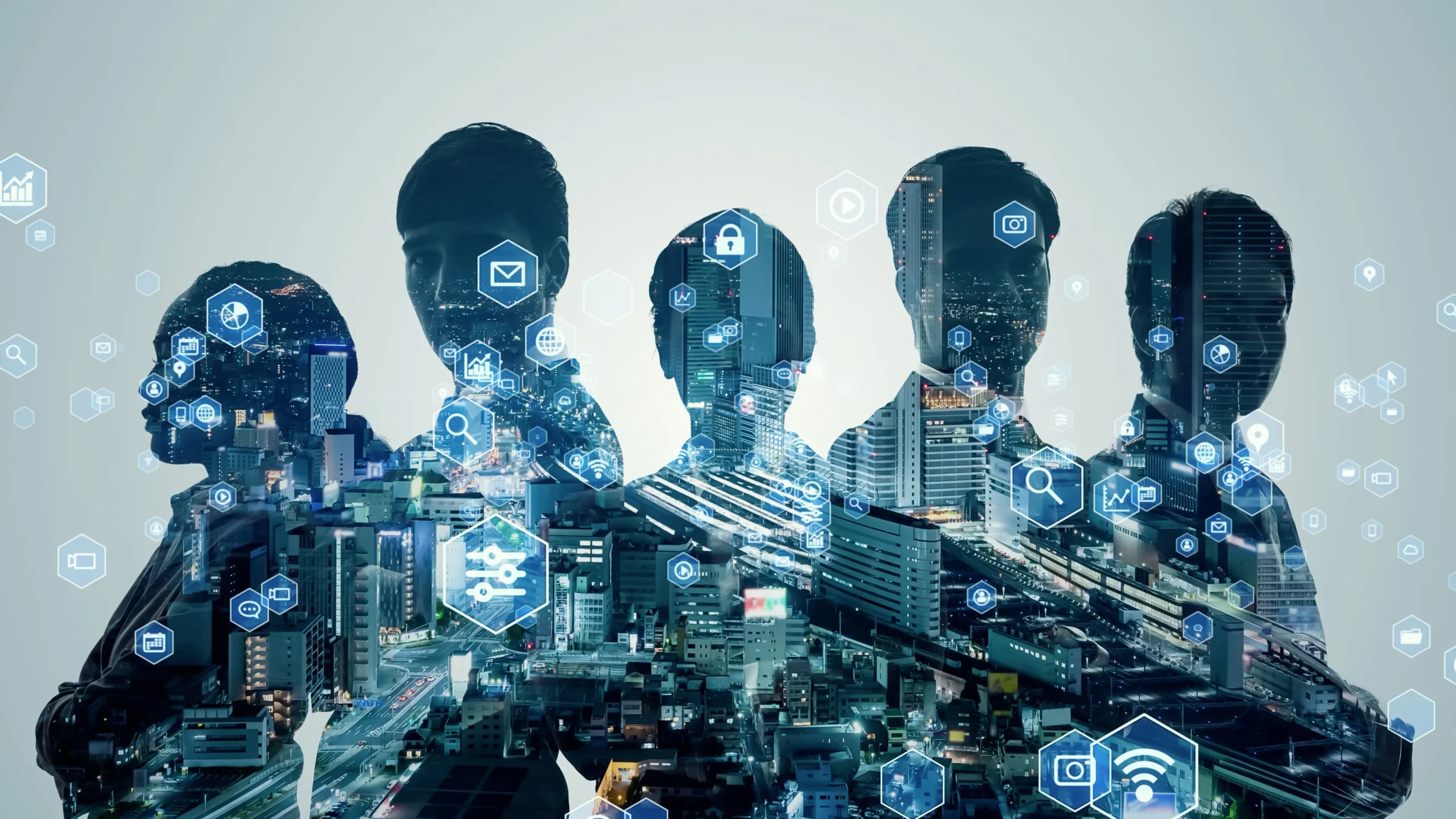 Business team silhouettes blended with a smart city skyline and digital technology icons representing innovation and connectivity.