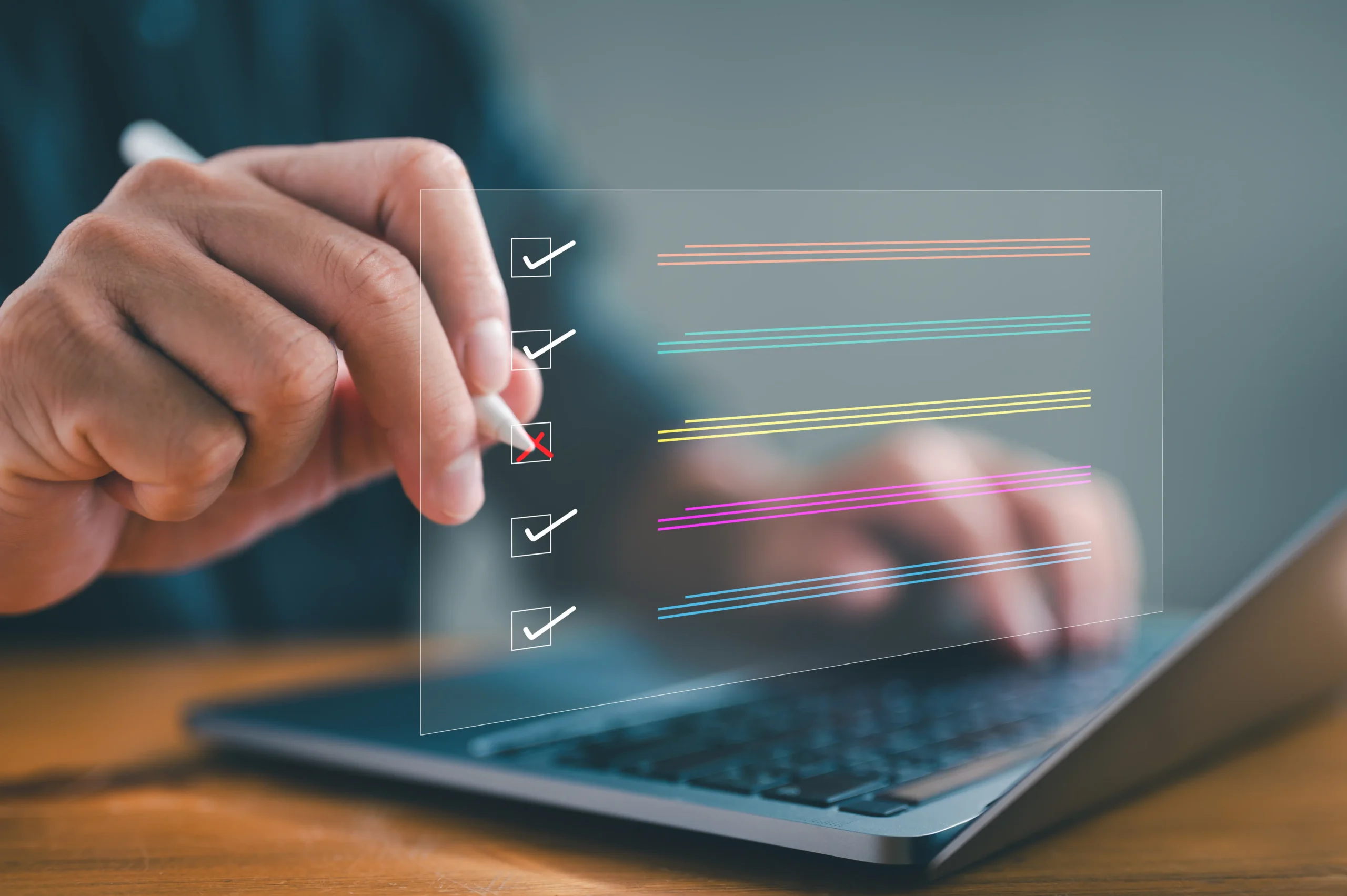Person completing an online checklist or survey form on a laptop with digital checkbox interface elements.